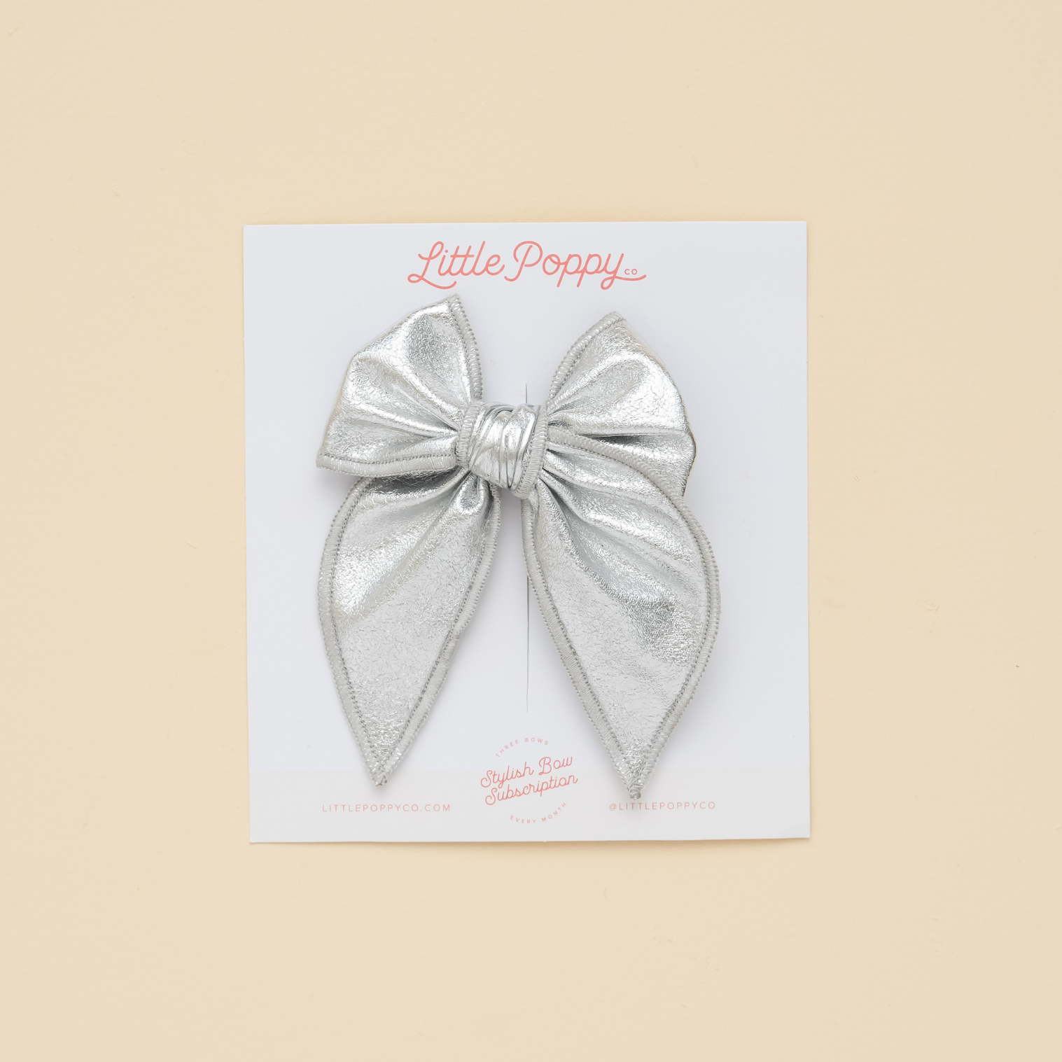 Silver Leather Bow Clip