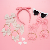 Pink Sparkle Hearts Bow Clip