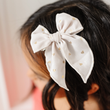 Beige Sparkle Hearts Bow Clip