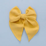 Mustard Summer Poplin Bow Clip